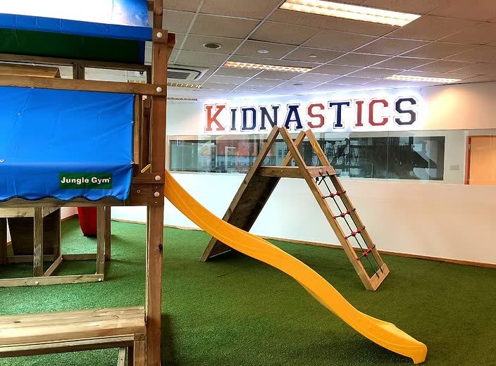 Kidnastics gross-motor area with climbing gym